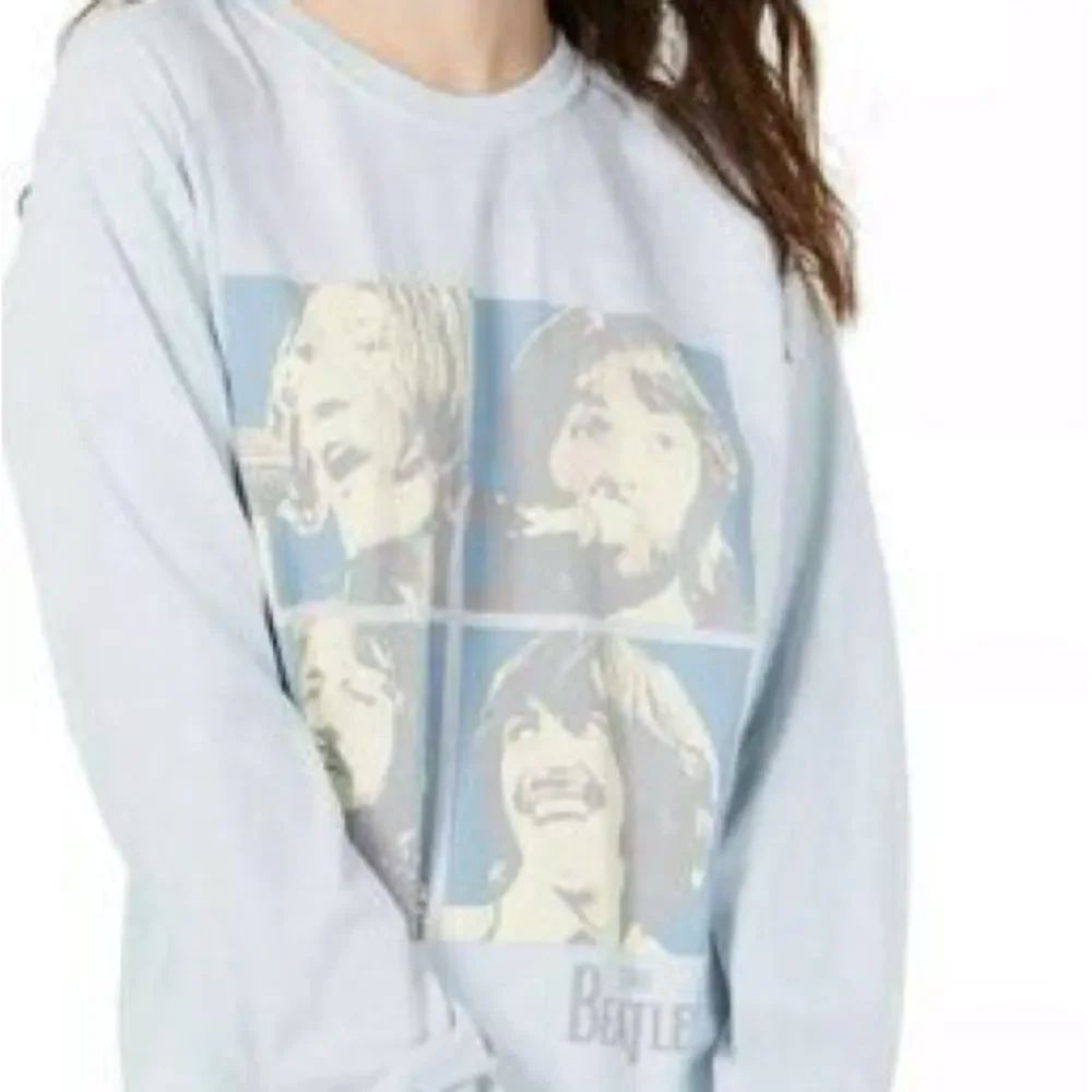 The Beatles Light Blue Graphic Crewneck Sweatshirt with raw edge hem